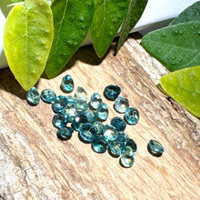  This parcel of 27 round cuts of natural unheated tourmaline ranges from light green to pale teal blue.&nbsp; They are all eye clean. The depth varies.