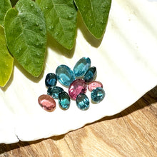  This parcel of 11 mixed cuts of natural unheated tourmaline in teal blue and pink. They are all eye clean. The depth varies.