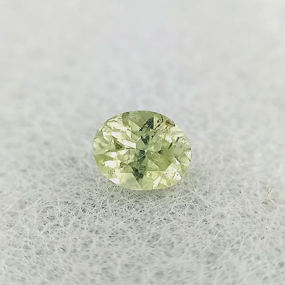 0.72ct Greenish Yellow Sapphire Oval Cut